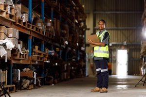 HBS staff member in spare parts warehouse